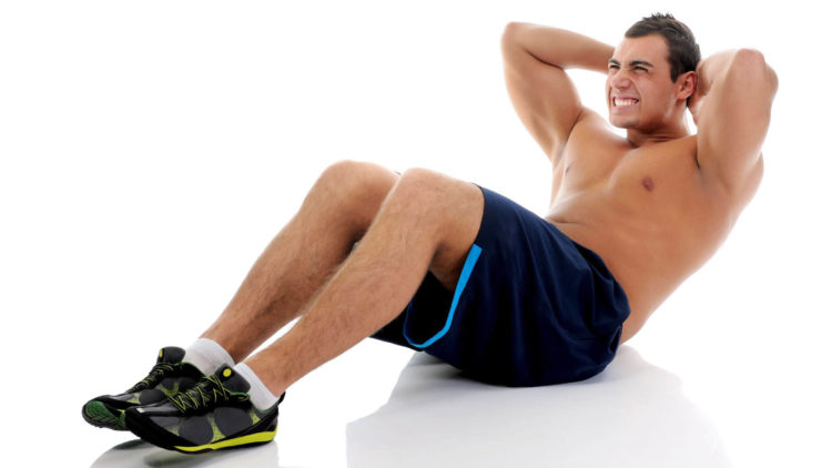 Abdominales ejercicios para futbolistas en el gimnasio